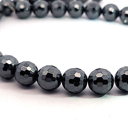 Hematite, 12 mm faceted strand of beads