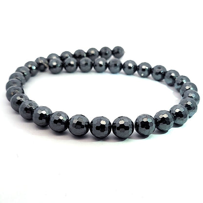 Hematite, 12 mm faceted strand of beads