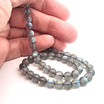 Labradorite AA, ball strand 6 mm