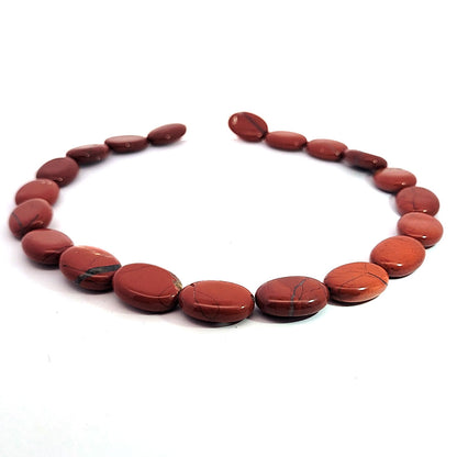 Red jasper, strand oval flat 20 x 14 mm