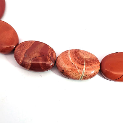 Red jasper, strand oval flat 25 x 20 mm