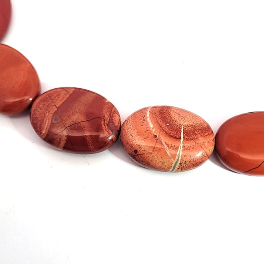 Red jasper, strand oval flat 25 x 20 mm
