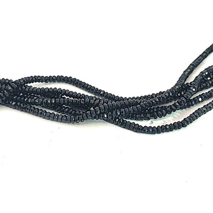 Black spinel, button strand 2 mm faceted