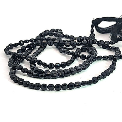 Black spinel, disc strand 3 mm faceted