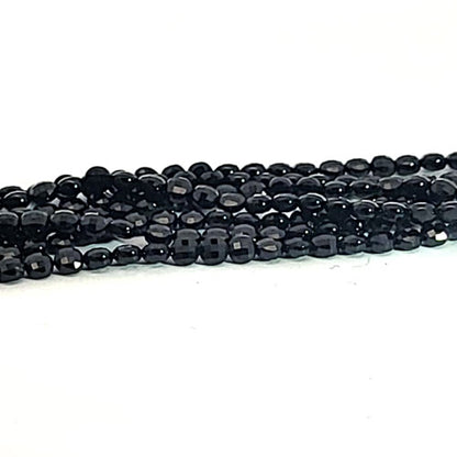 Black spinel, disc strand 3 mm faceted