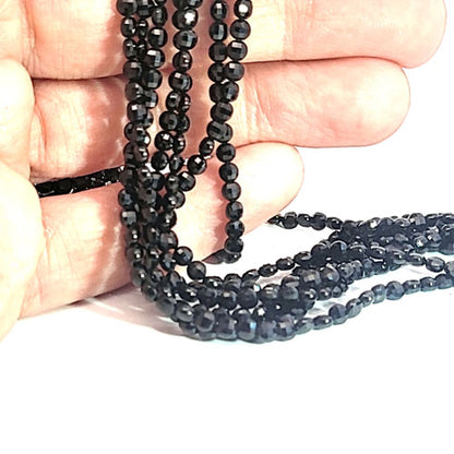 Black spinel, disc strand 3 mm faceted