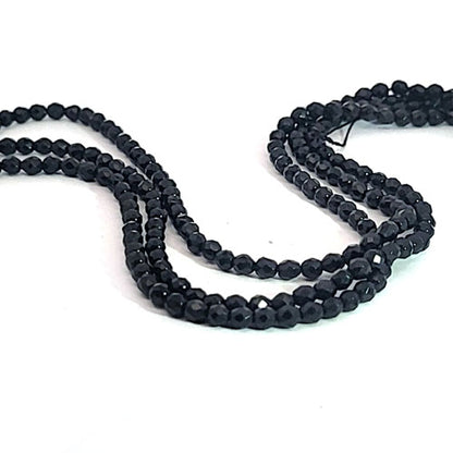 Spinell schwarz, Kugelstrang 2,5 mm facettiert by Steindesign