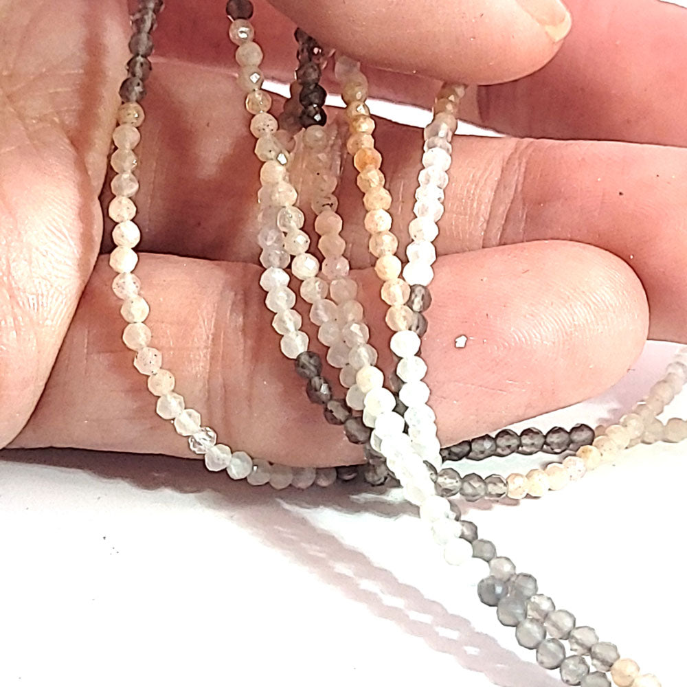 Moonstone multi, spherical strand 2.5 mm faceted