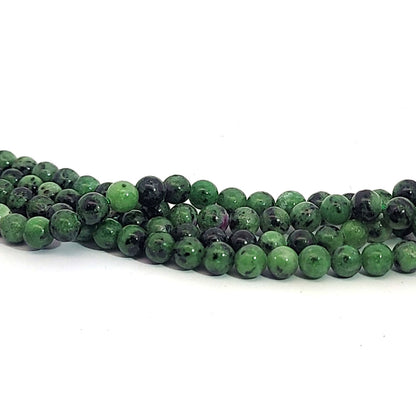 Ruby zoisite, ball strand 6 mm
