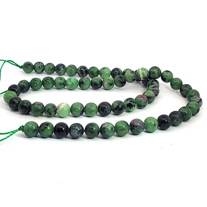Ruby zoisite, ball strand 6 mm